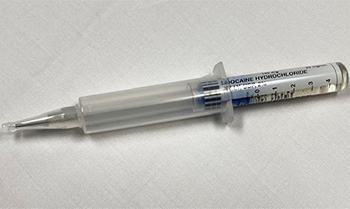 Urojet syringe filled with numbing gel.