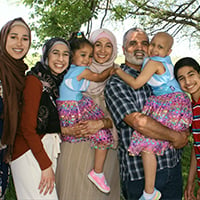 Amani Hasian with her husband and five children.