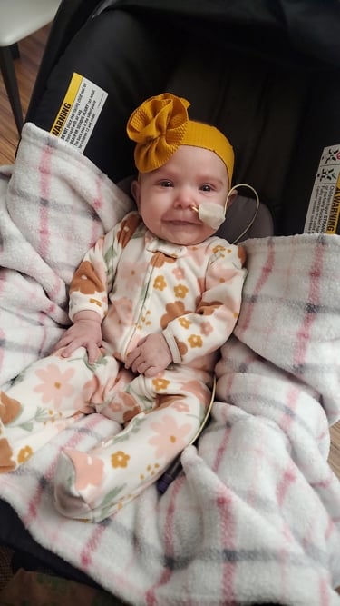 Wrenley in car seat