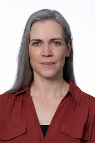 Dr. Kathryn Keeler in front of a white background.