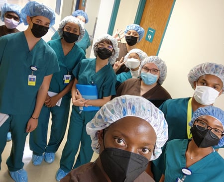 Eleven alumni participants of the STAR 2.0 program wearing PPE at Children's Mercy.