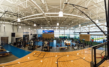 Panoramic image of the gym at Village West.