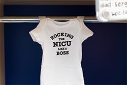 Photo of onesie that reads, "Rocking the NICU like a boss."