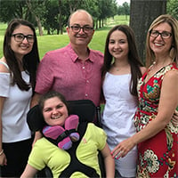 Terrence Gallagher with his wife and their three daughters.