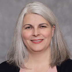 Headshot of Christine Quandt smiling.