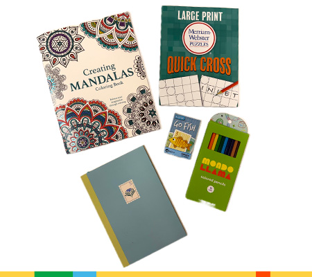 Coloring book, crossword puzzle book, journal book, 'Go Fish' card game, and pack of colored pencils.