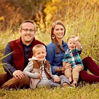 Ryan Goble with his wife and two sons.