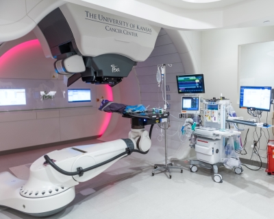 A young patient receiving a proton therapy treatment
