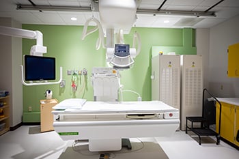 Fluoroscopy room with an imaging table at Children's Mercy.