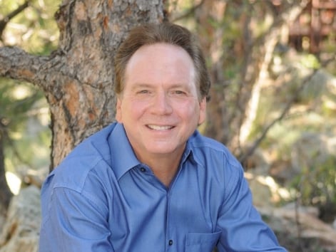 A professional portrait of Dr. Alan Wolfelt