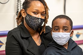 La Daya Gordon with her son, Chase Jackman at Children's Mercy and wearing face masks.