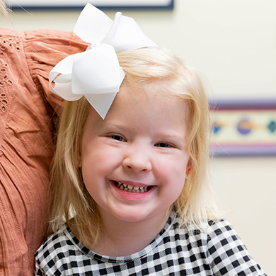 Young Children's Mercy patient smiling.