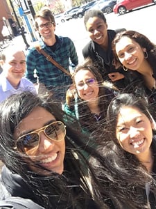 Seven GI fellows standing outside and smiling