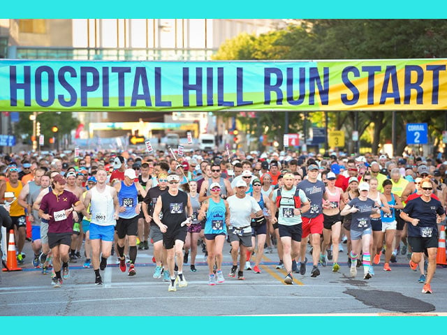 Hospital Hill Run runners at the start line of the race.