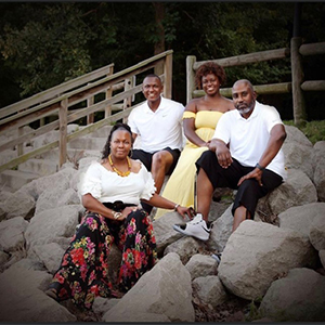 Glenda King, CM employee, with Reuben King (husband), Elijah and Alexis King (son and daughter). Photo taken in Independence at small park off of Highway 40.