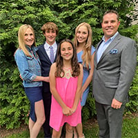 Mia Hotze with her husband and their two daughters and son.