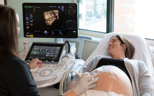 Pregnant woman getting a sonogram