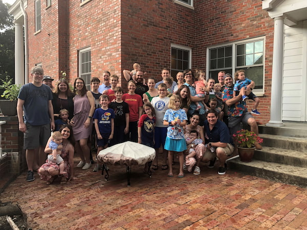 A photo of the Children's Mercy Gastroenterology Fellowship group and their families.