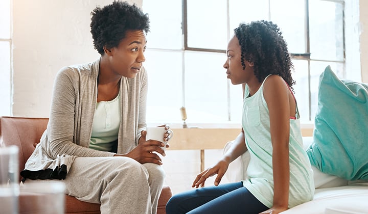 Mom talking with daughter