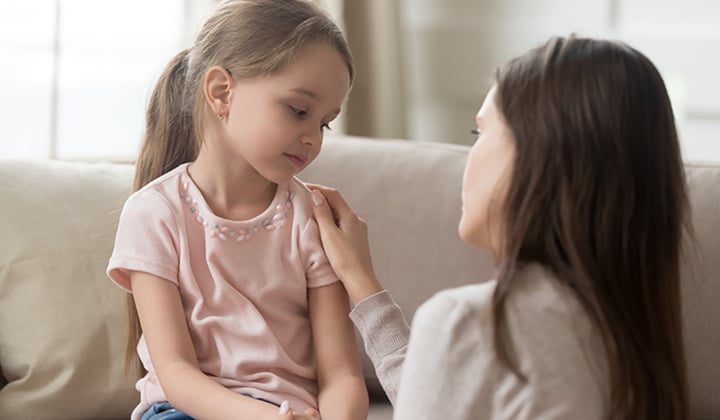 Mom consoling daughter 