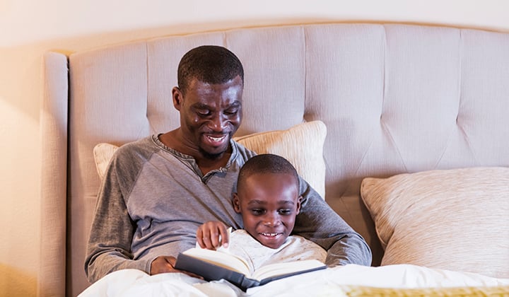 Dad reading to child