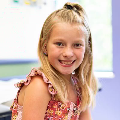 Young child seated in a clinic room