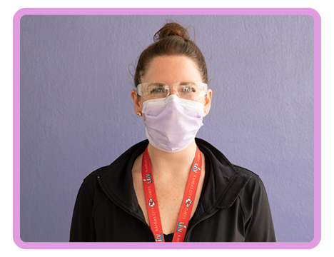 Children's Mercy staff member in protective glasses and face mask