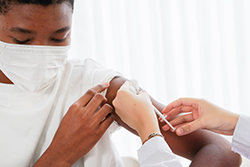 child getting vaccine