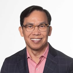 A headshot photo of Winston Manimtim, MD